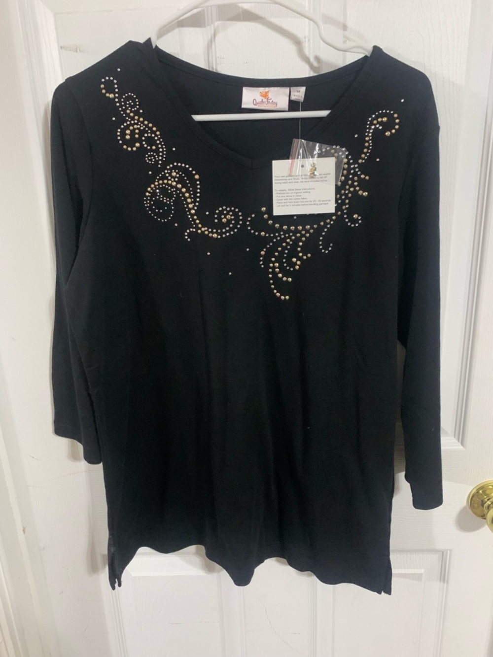Quacker Factory Black Long Sleeve V-Neck Top with Gold Rhinestone Swirls